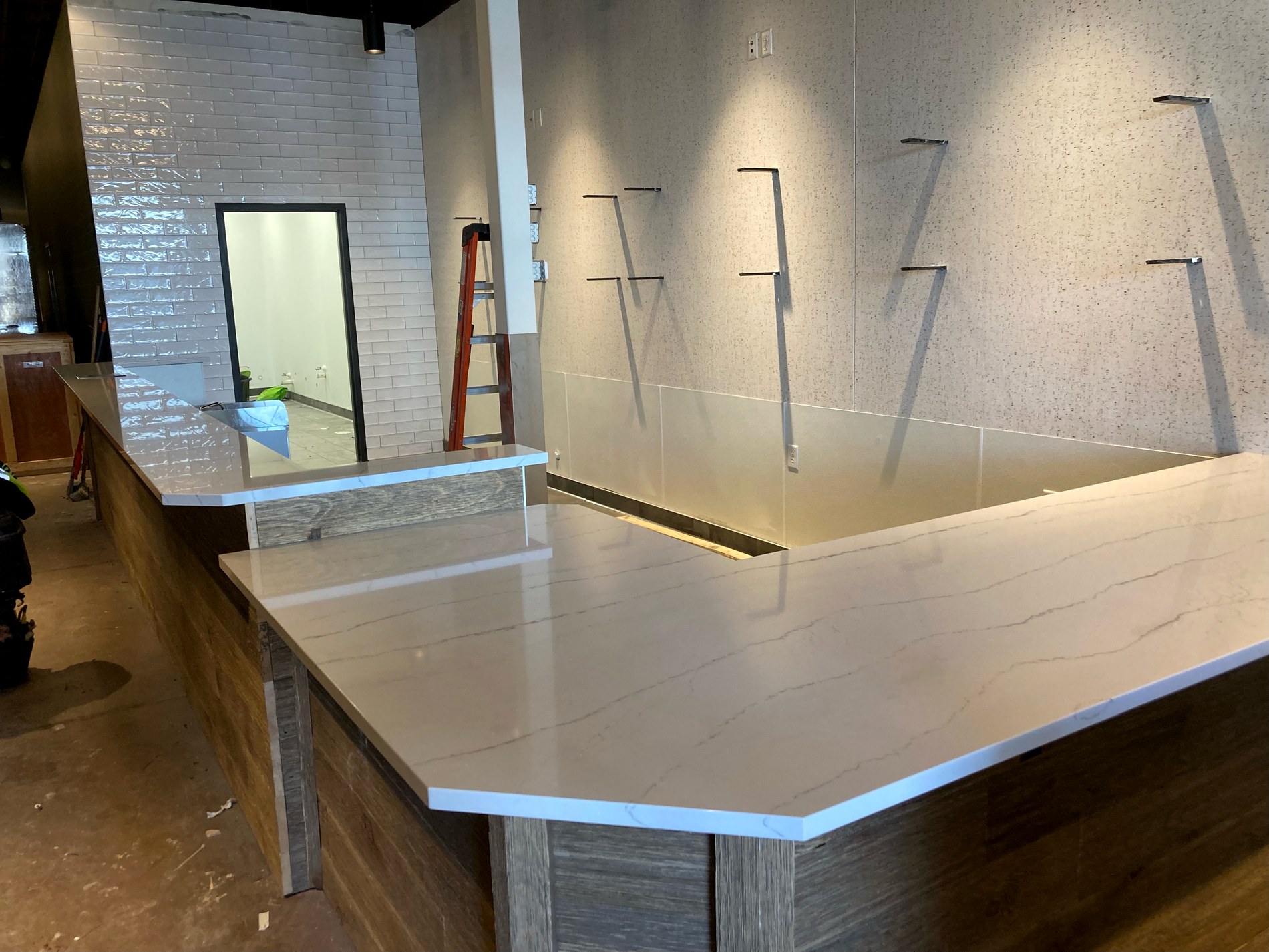 Large-format stone counter with integrated sink