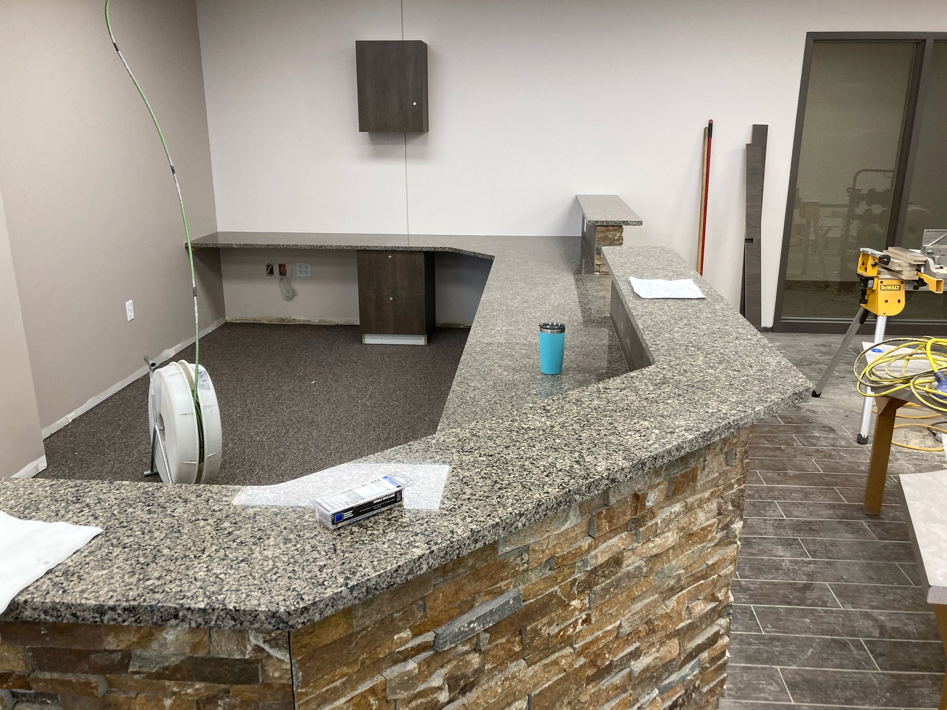 Stone-faced service counter and workspace